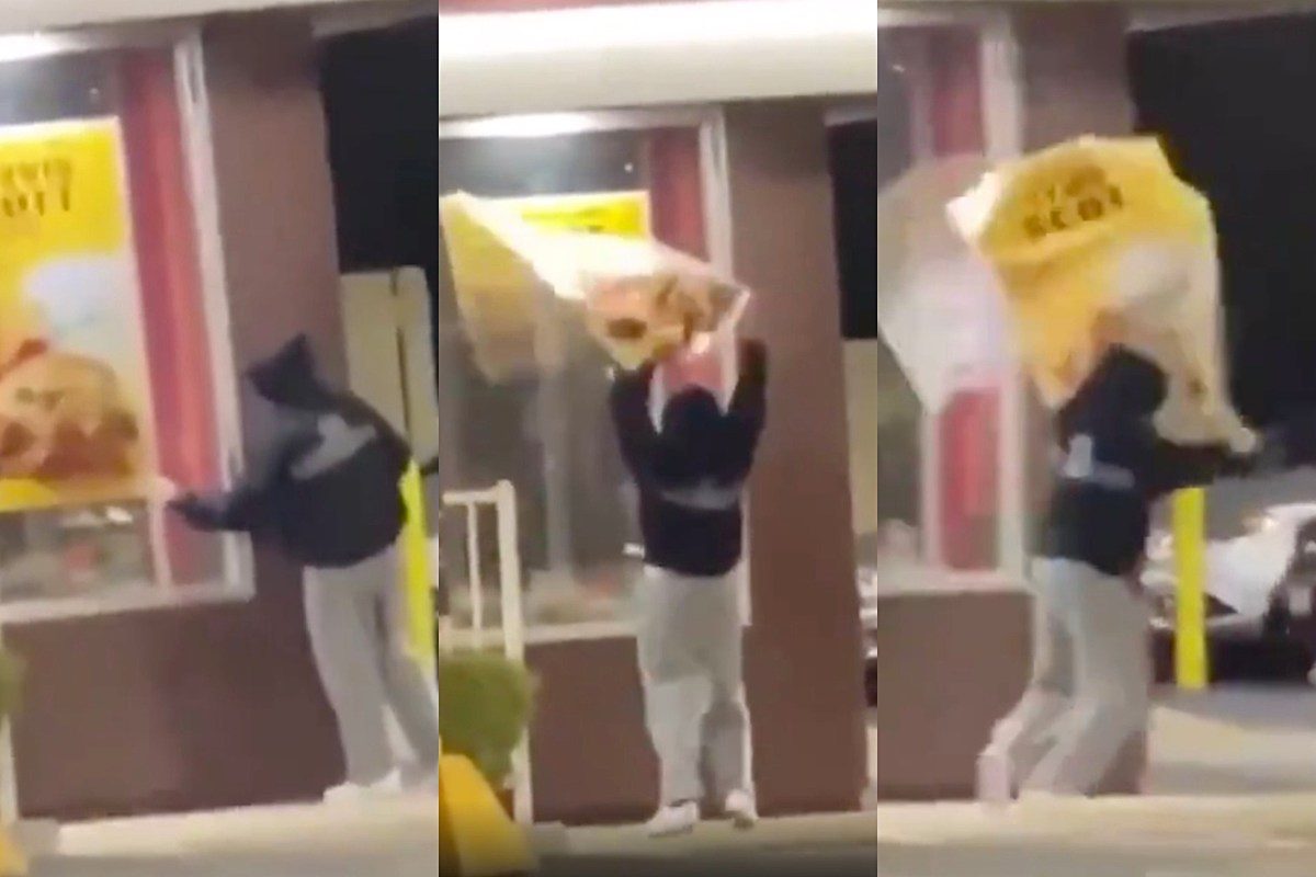 Fan Steals Travis Scott Meal Poster From a McDonald’s Window: Watch
