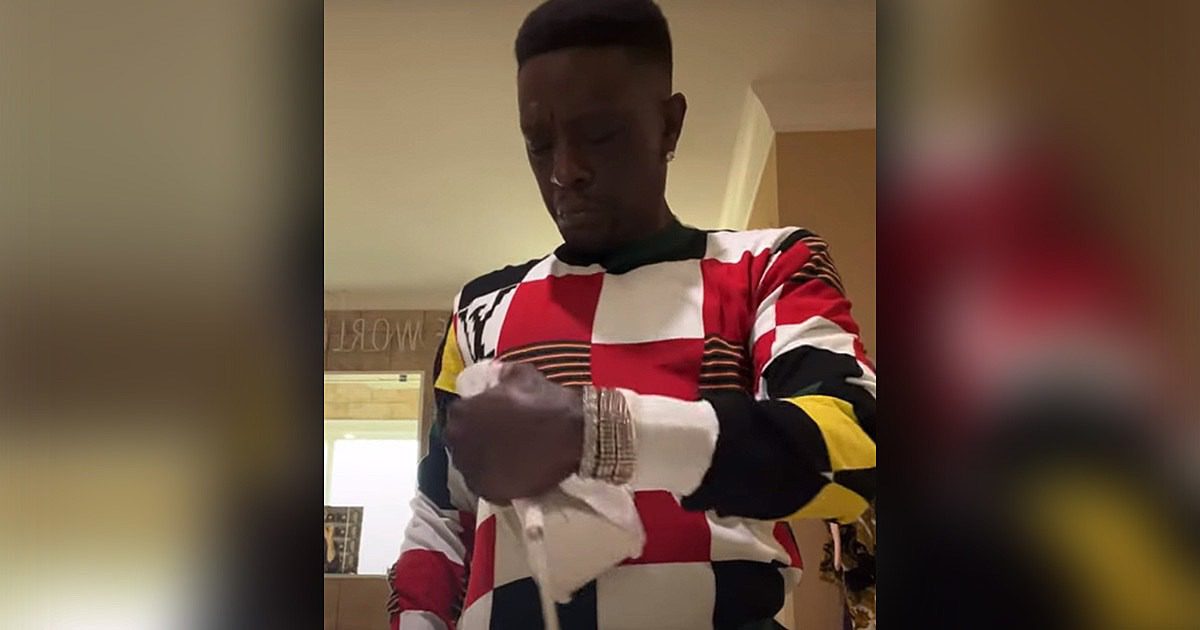 Video Shows Boosie BadAzz Ironing His Shirt While Wearing It