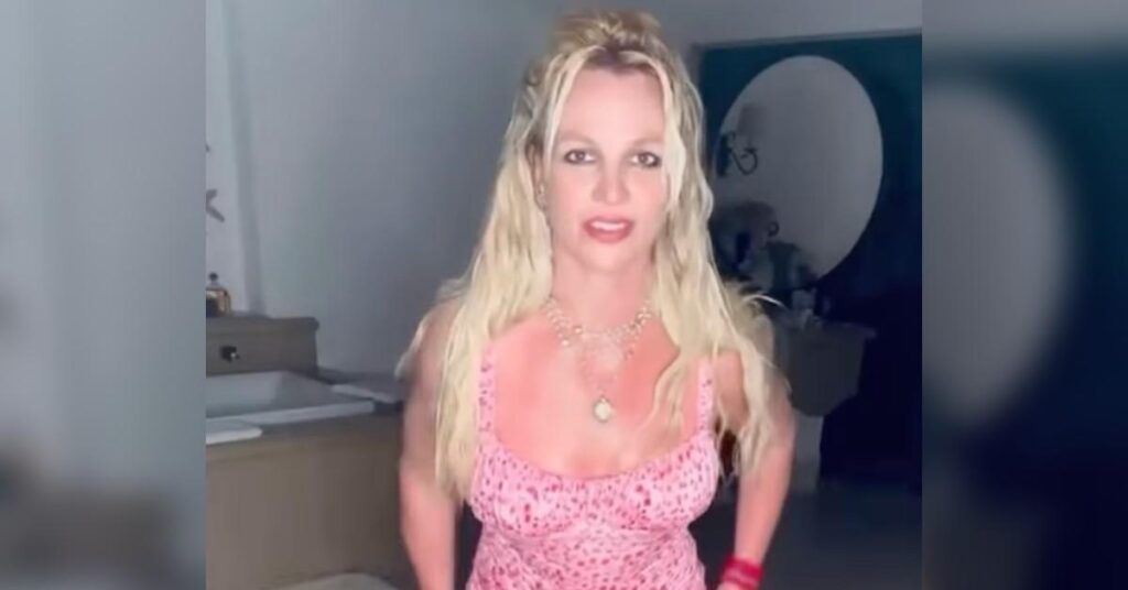 Britney Spears Dances Around in Skintight Pink Dress After Announcing She Evacuated Her L.A. Home Amid Raging Wildfires: Watch