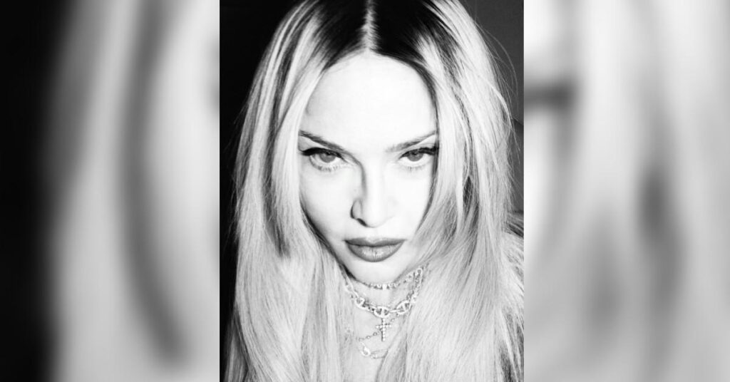 Madonna Shows Off Her Legs in Tiny Black Dress and High-Heeled Boots — See the Sultry Photos!