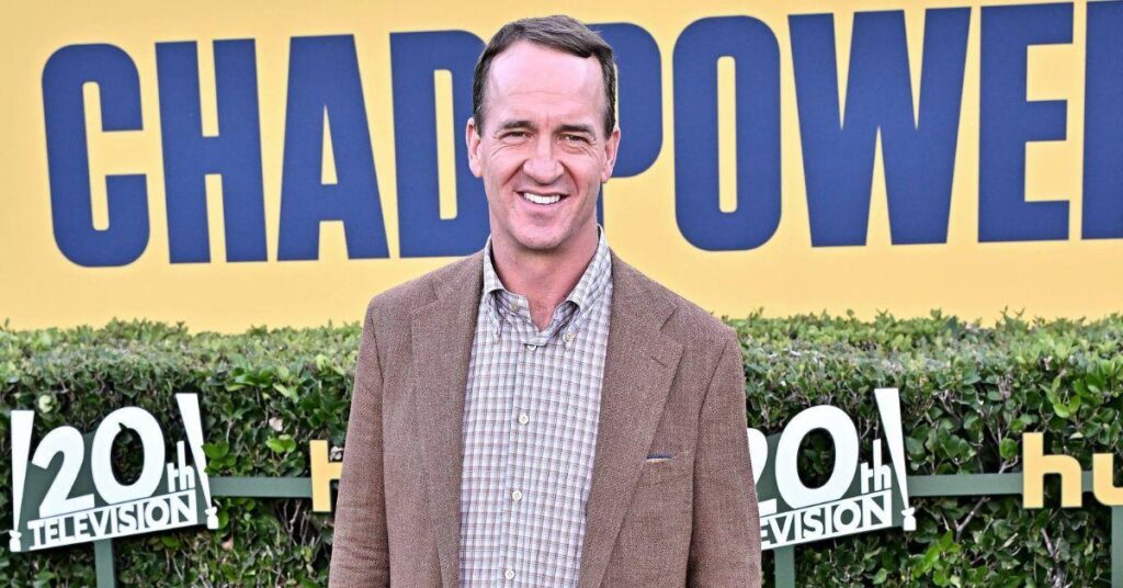 image of Peyton Manning looked back on meeting the monarch in 2007.