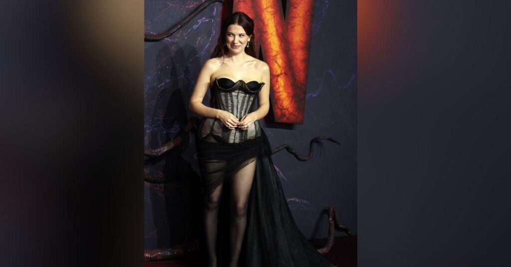 image of Millie Bobby Brown wore a daring corset gown at the 'Stranger Things' Season 5 London premiere.
