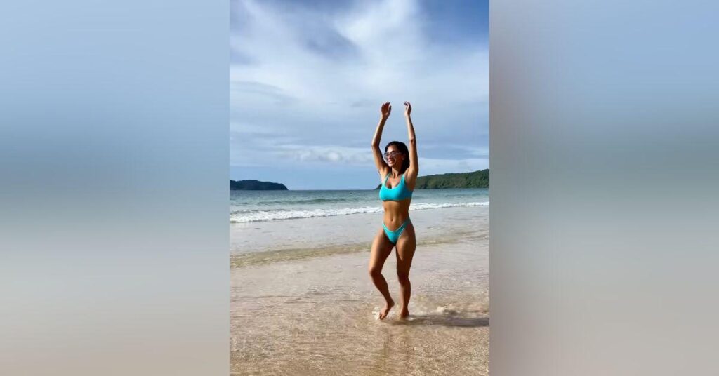 Image of Nicole Scherzinger took time off to swim on the beach.