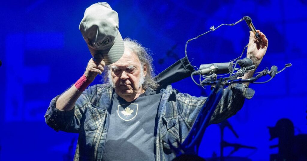 Image of The rock star was seen driving his 1959 Lincoln Continental convertible in California.