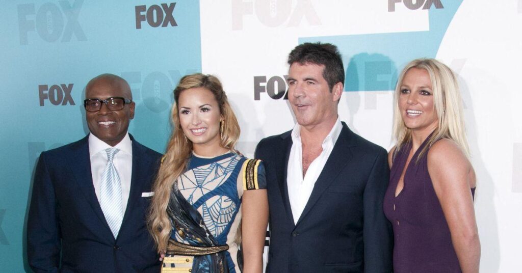 Image of Simon Cowell worked with Britney Spears on X Factor.