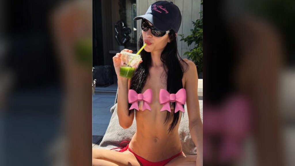 Photo of Amelia Gray Hamlin dared to bare it all by a swimming pool