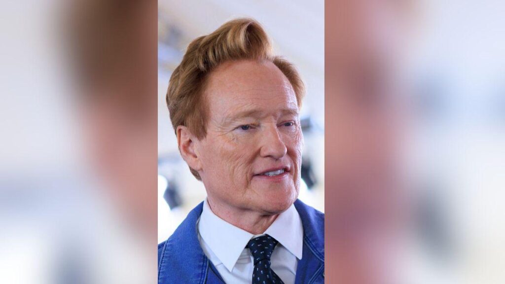 image of Conan O' Brien addressed the difficulty of speaking about Rob Reiner on a red carpet.
