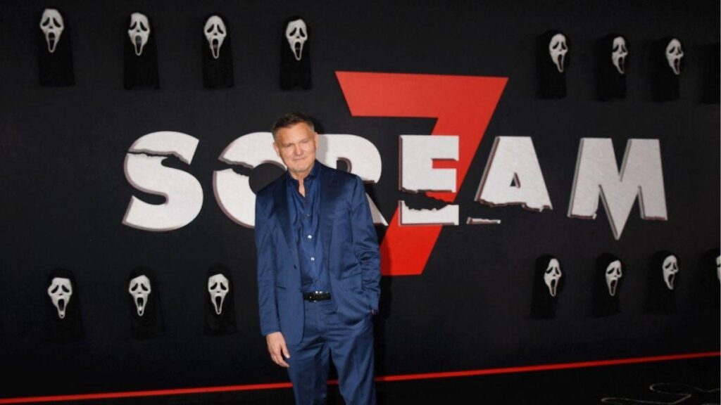 Image of Director Kevin Williamson addressed the protests at the film premiere.